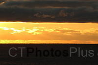 Sunrise through the clouds over the sea U82A8599